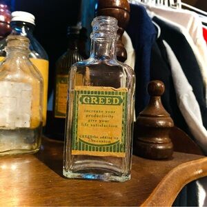 Greed - Found Art - Vintage Glass Botfle with New Label
